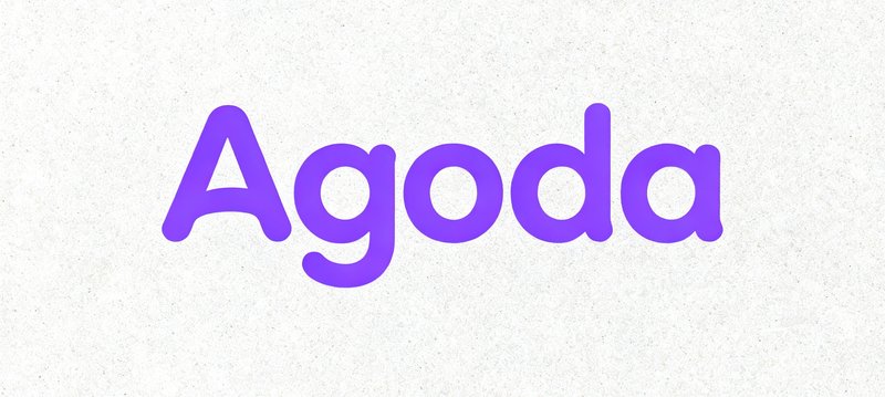 Agoda品牌logo，简洁的紫色圆角字体设计，全球知名酒店预订平台标识